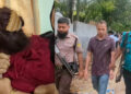 রাজশাহীতে ফ্ল্যাট থেকে নারীসহ পুলিশ কর্মকর্তা আটক