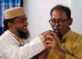 মিষ্টি নিয়ে জামায়াত প্রার্থীর বাসায় মির্জা ফয়সল